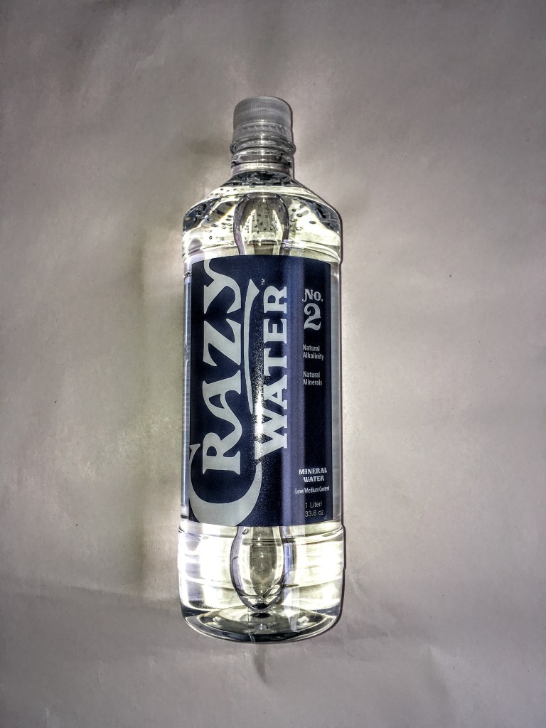 Bottle of Crazy Water, front view