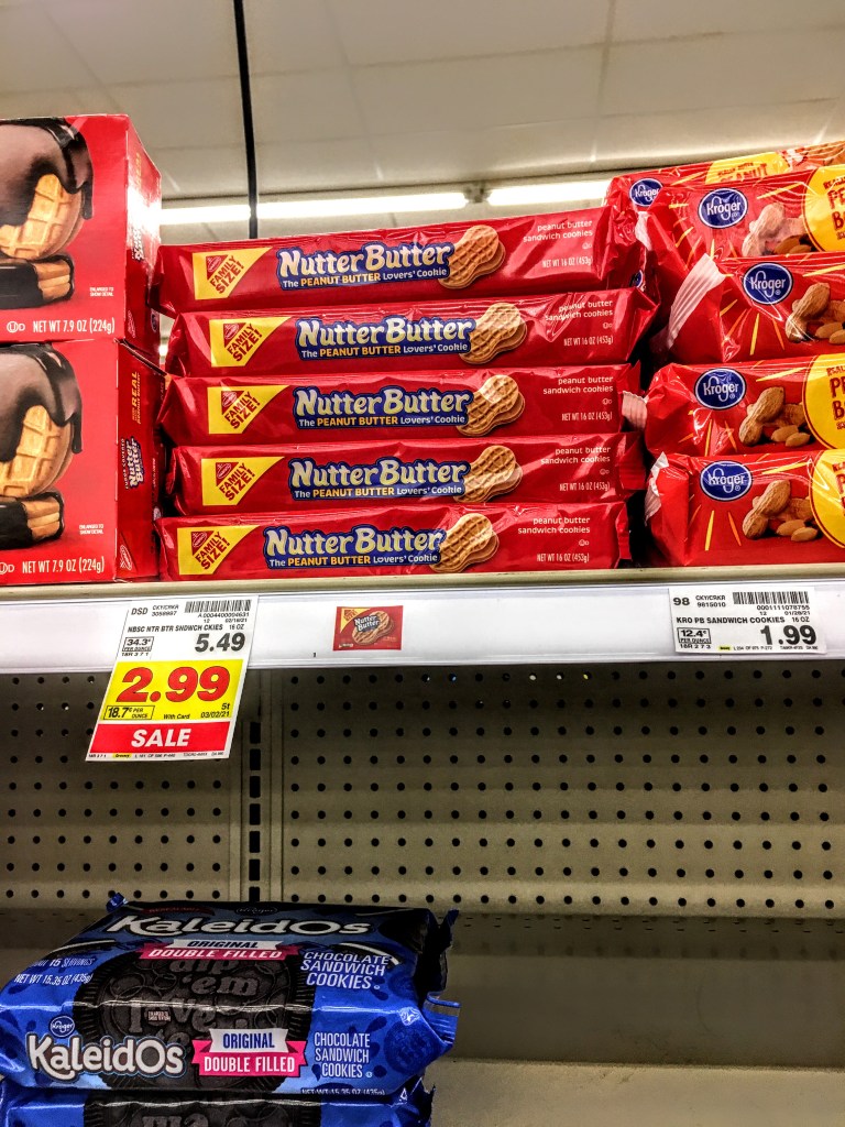 A store shelf displaying Nutter Butters. 